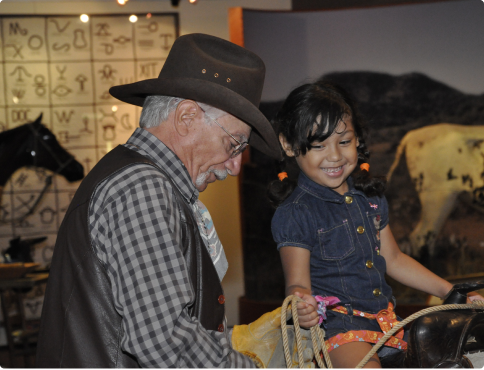 Docent teaching a child
