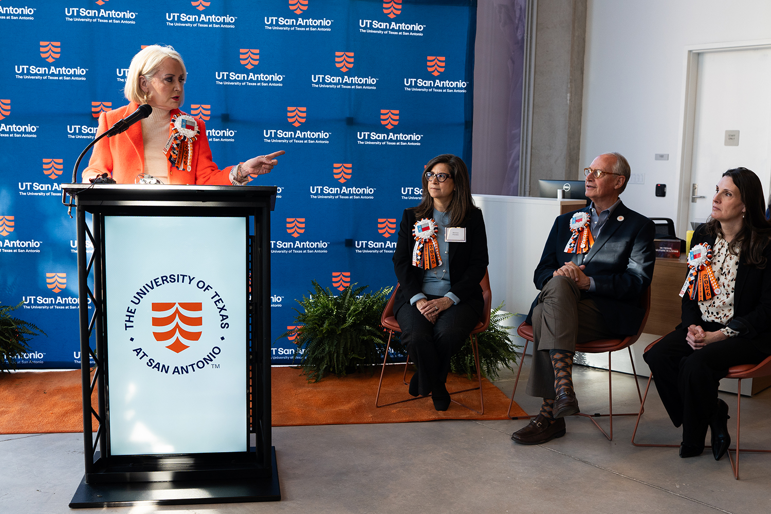 President and CEO of Centro San Antonio Trish DeBerry delivers remarks at podium