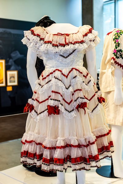 A performance dress worn by Lydia Mendoza, loaned by the Texas Music Museum.