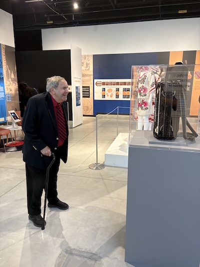 Clayton Shorkey, Ph.D., president of the Texas Music Museum, views an accordion belonging to conjunto pioneer Bruno Villarreal. The Texas Music Museum loaned to the ITC for the Puro Conjunto exhibit.