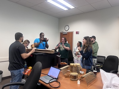 UT San Antonio students review objects from the ITC's demonstration collection, determining what to put in a Texkit museum-in-a-box experience.