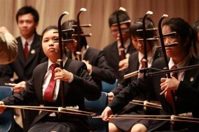 Erhu players in a Chinese orchestra in Yishun Junior College.